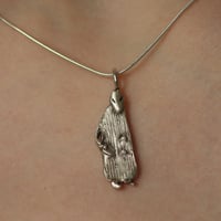 Image 2 of Advent day 11- Alien in a trenchcoat in silver