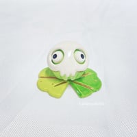 Image 2 of Silly Frog On Lily Pad With Skull Mask Ceramic Figurine