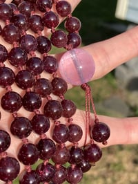 Image 3 of Asterism Garnet Mala with Gem kunzite Guru Bead, Asterism Garnet 108 Bead Hand Knotted Gemstone Mala