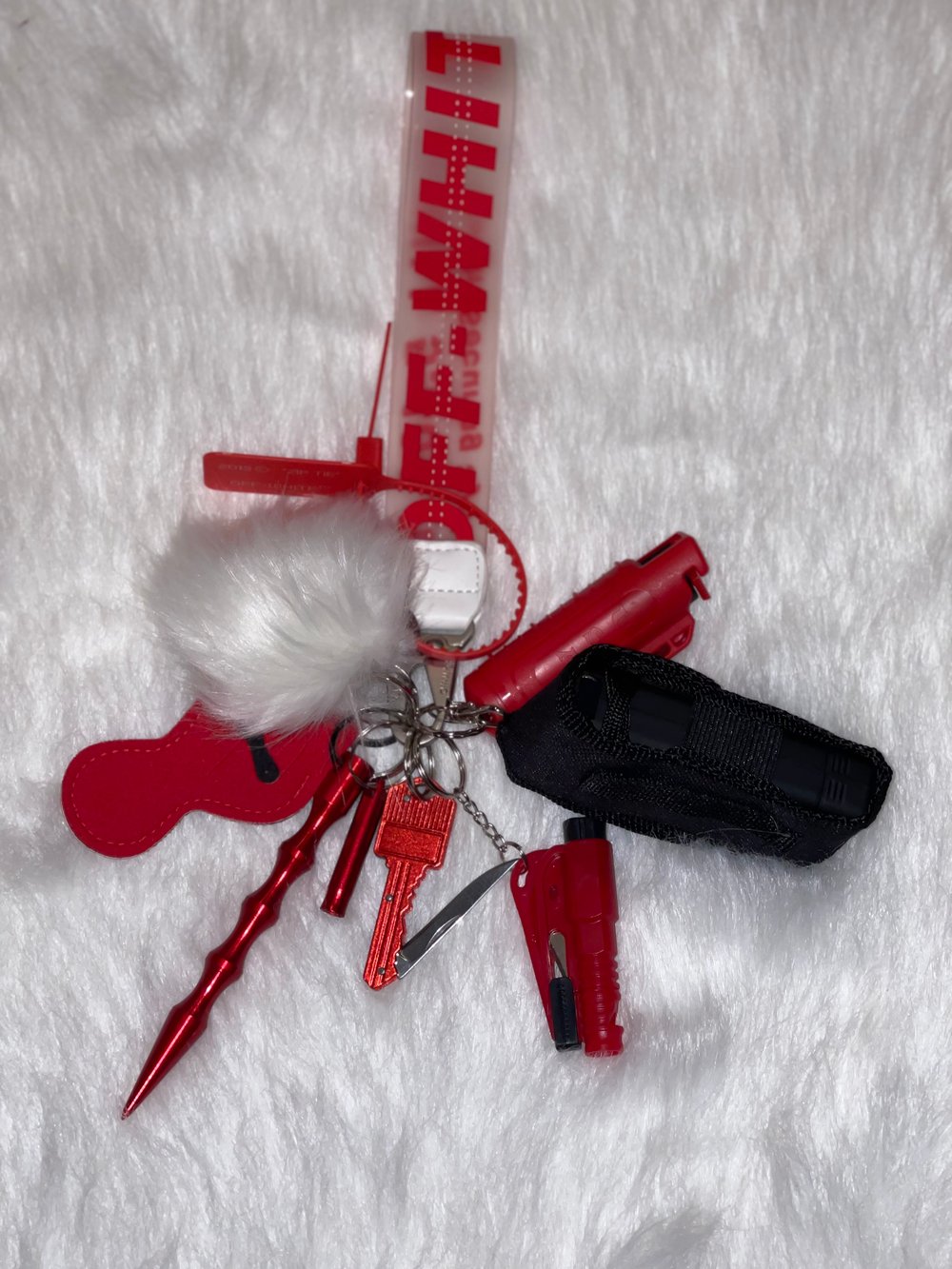 Image of Off-white keychain i