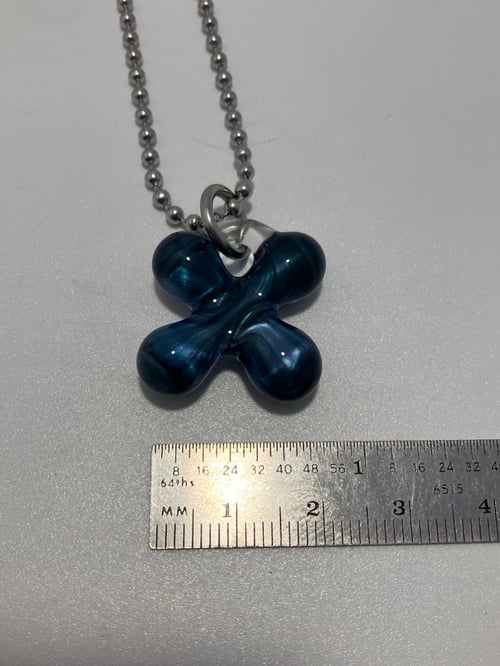Image of metallic blue clover