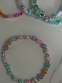 Image 13 of Warm Serene Brushstrokes Dinosaur Tumbler Accessory Set | Bow, Straw Bauble & Bracelets