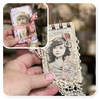 Image 2 of Petite snippet sample french lace book in a tiny french biscuit tin.