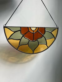 Image 1 of amber window topper