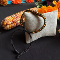 Image 3 of La Negra With Gold Bracelet 