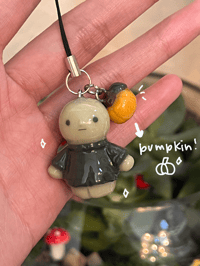 Image 2 of sweater weather smiski charm! 🎃