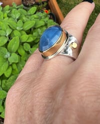 Image 1 of Gemmy Faceted Blue Opal 18 Karat Gold Setting