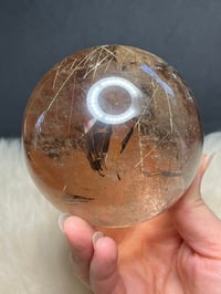 Image 19 of Golden Rutile In Smoky Quartz Sphere #1771