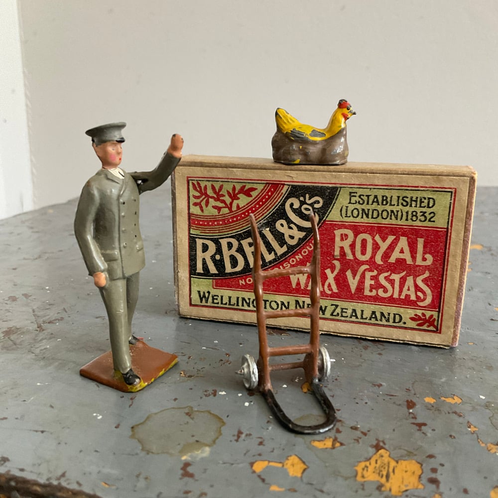 Image of Guy With Chook & Vesta Box