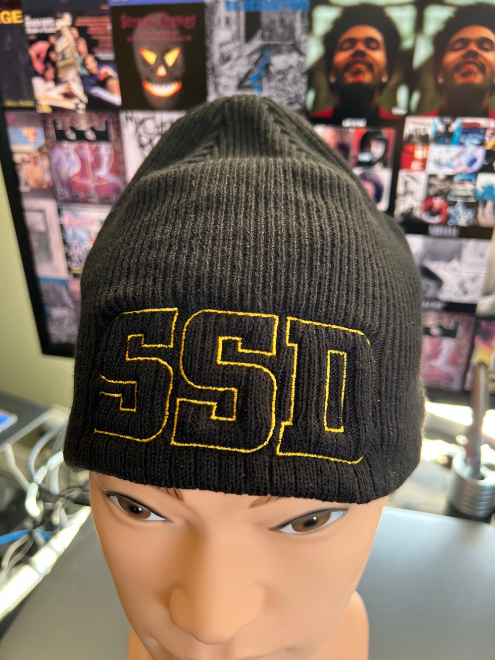 Black New Era Knit beanie hat with Gold Outline SSD logo 