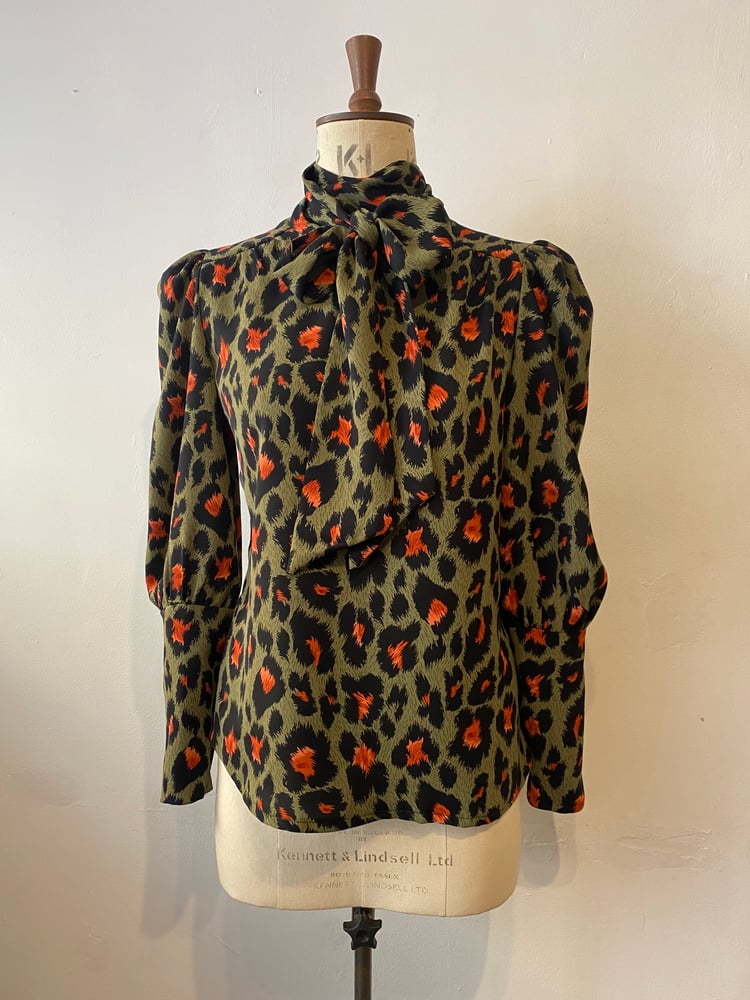 Image of Leopard tie neck pull on blouse