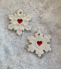 Image 2 of Snowflake with a heart on a wire stake 