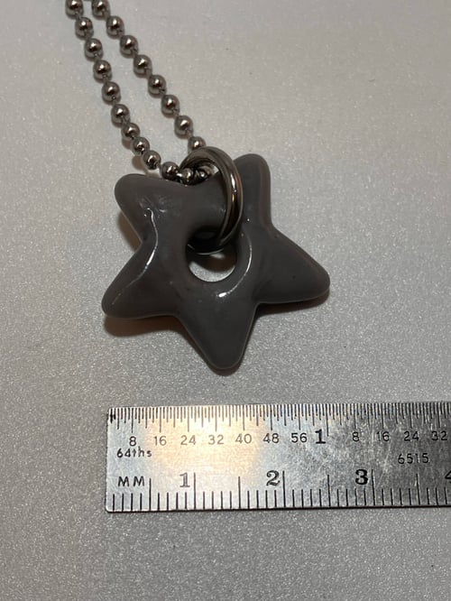 Image of mini light grey star 