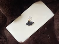 Image 1 of Moth Kindle Dust Plug