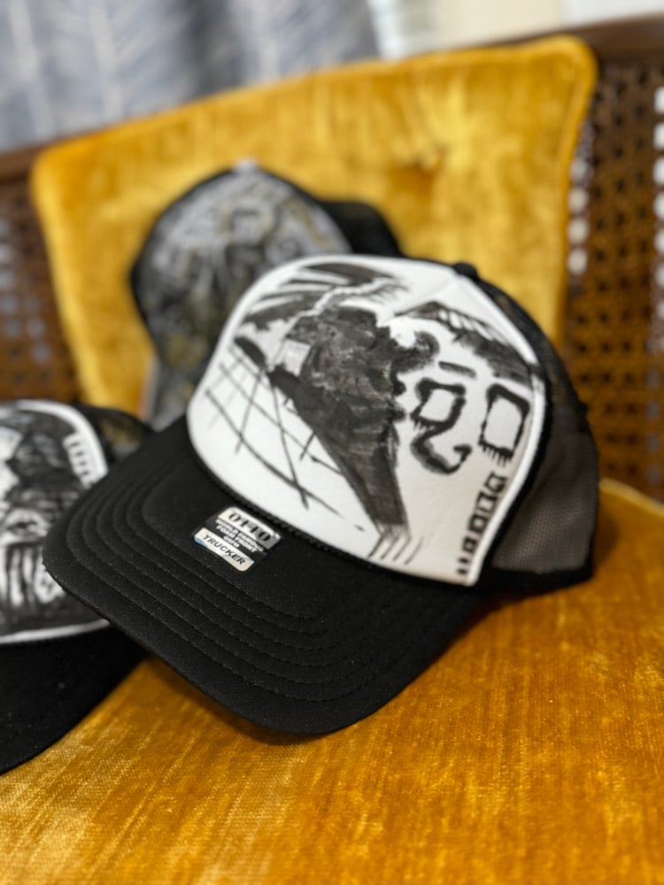 Image of trucker hats/snap backs