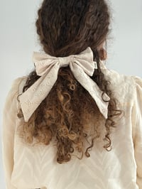 Image 1 of Cream hairbow - broderie anglaise style