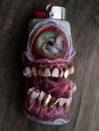 Image 4 of Parasite cyclops - Glow in the Dark Bic Lighter Sleeve OOAK