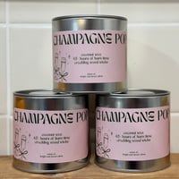 Image 1 of champagne pop scented paint can candle