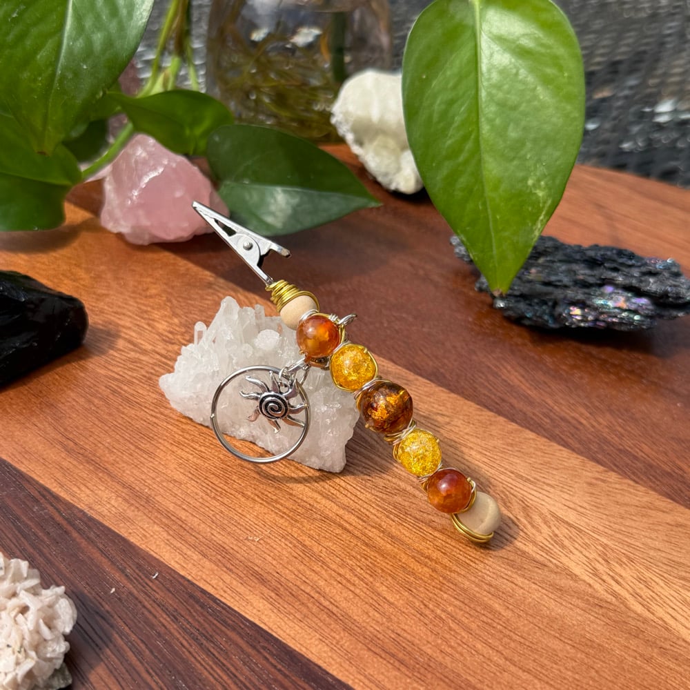 Image of sun ray clip keychain