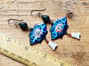 Haunted earrings