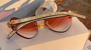 Image of AUTHENTIC CARTIER CT0286O 003 - [MIXED HORN] CUSTOM LENS 008