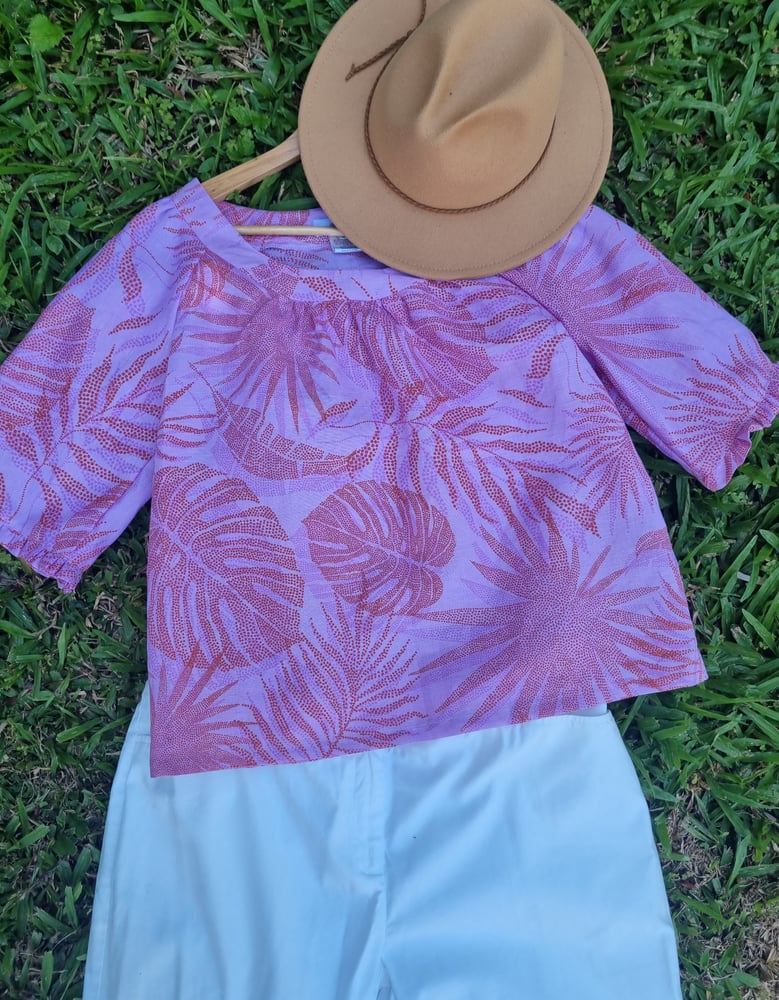 Image of TUNIC TOP in TROPICAL LILAC. Size Small & Large