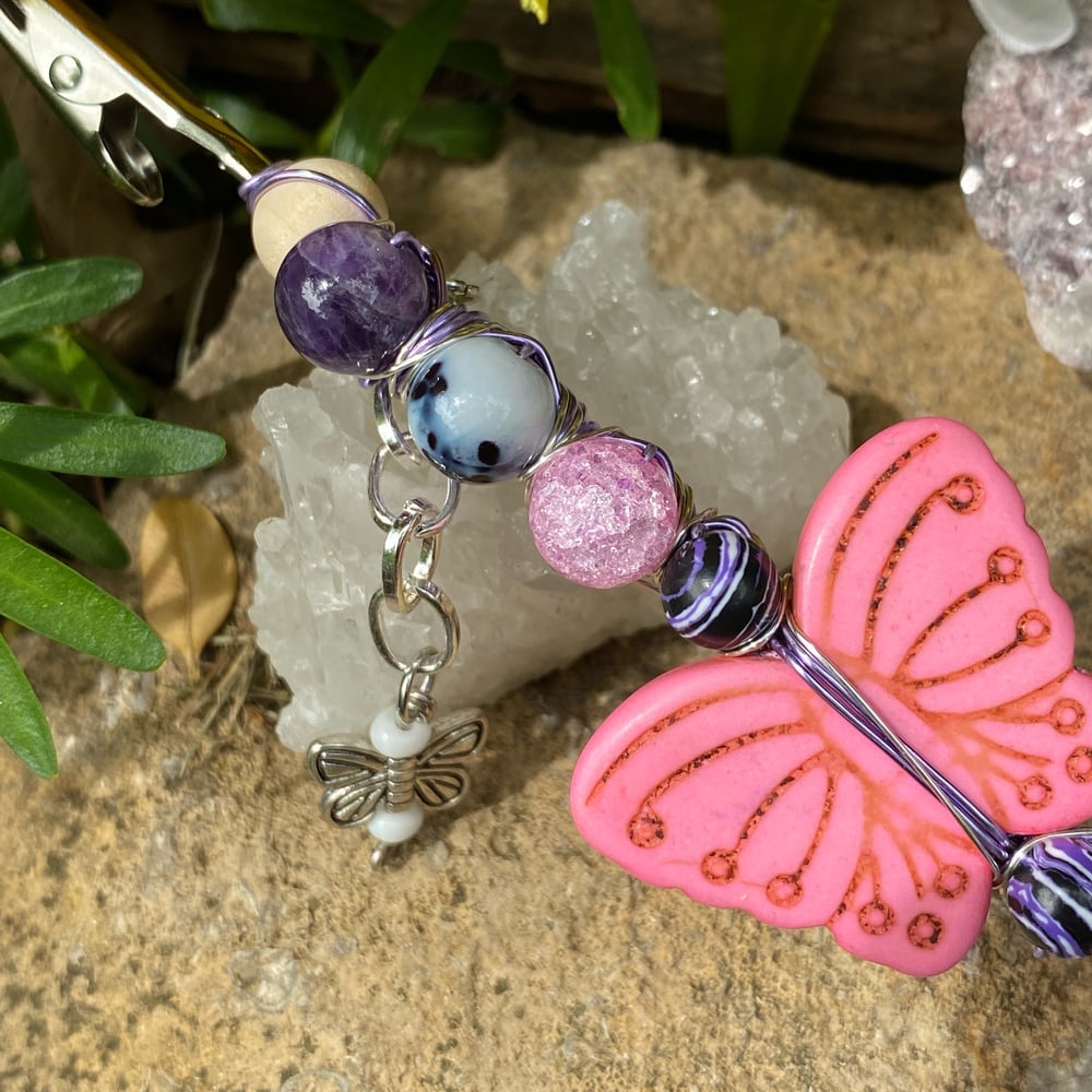 Image of pastel butterfly roach clip 