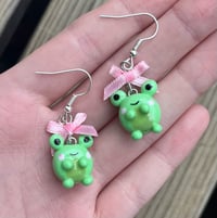 Image 2 of Coquette frog earrings