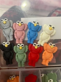 Kaws charm mix