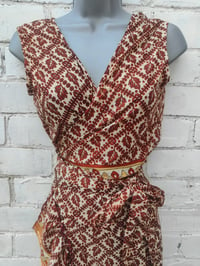 Image 11 of Pasha Co ord set top and frill wrap skirt Rust and cream