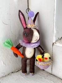 Chocolate Dutch Rabbit with Carrot and Basket of Chicks