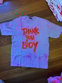 Image 2 of Purple and pink tie dye T shirt with bright orange text (3XL)
