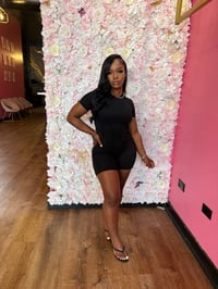 Image 2 of black shorts bodysuit. 