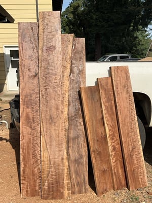 Various figured walnut boards.