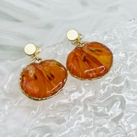 Image 1 of ORANGE FLORAL DANGLES