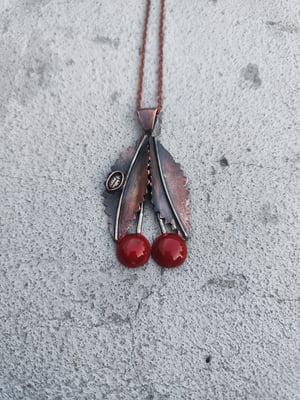 Cherry pendant with ladybug 