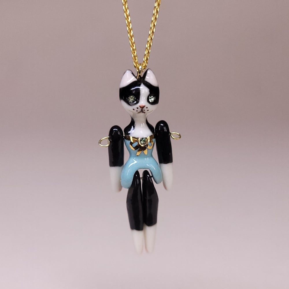 Image of Tuxedo Porcelain & Gold Vermeil Articulated Doll Pendant