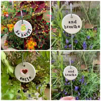 Image 2 of Various Plant related Tags on a wire stake or twine