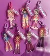 xg 'something ain't right' bratz-inspired keychains