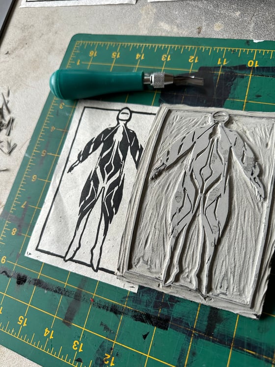 Image of Mini body suit concept Lino print. 4x6