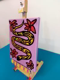 Image 4 of Snake in the Flowers