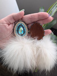 Image 2 of "Crystal Lake" with detachable pompoms