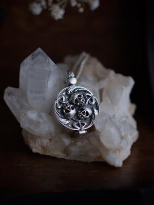 Image of TRINITY KEEPSAKE LOCKET