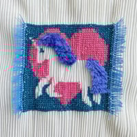 Image 2 of cross-stitch unicorn tunic
