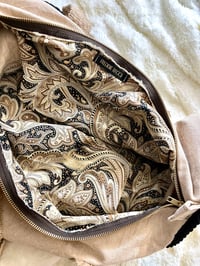 Image 5 of Tan + Black Duffle Bag