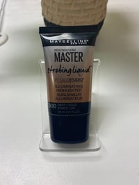 Image 1 of Maybelline Strobing Liquid Illuminating Highlighter, Deep Gold