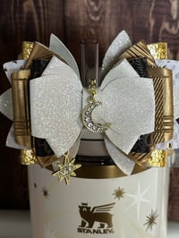 Image 1 of Starlight Shimmer Cream, Brown, and Gold Star Tumbler Straw Topper Bow