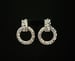 Image of Silver Beaten Circle Clip-On Earrings 