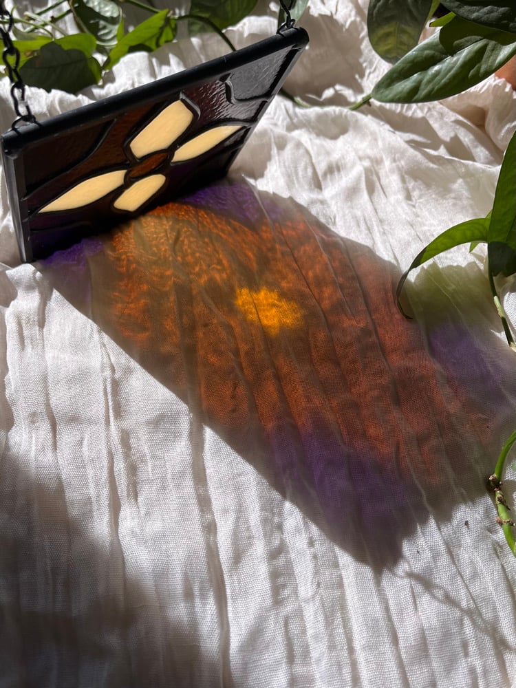 Image of Dark amber flower tile