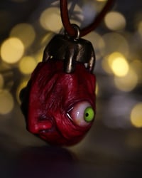 Image 22 of Egg of the King big eyes pendant, leather cord, brass hardware, OOAK,